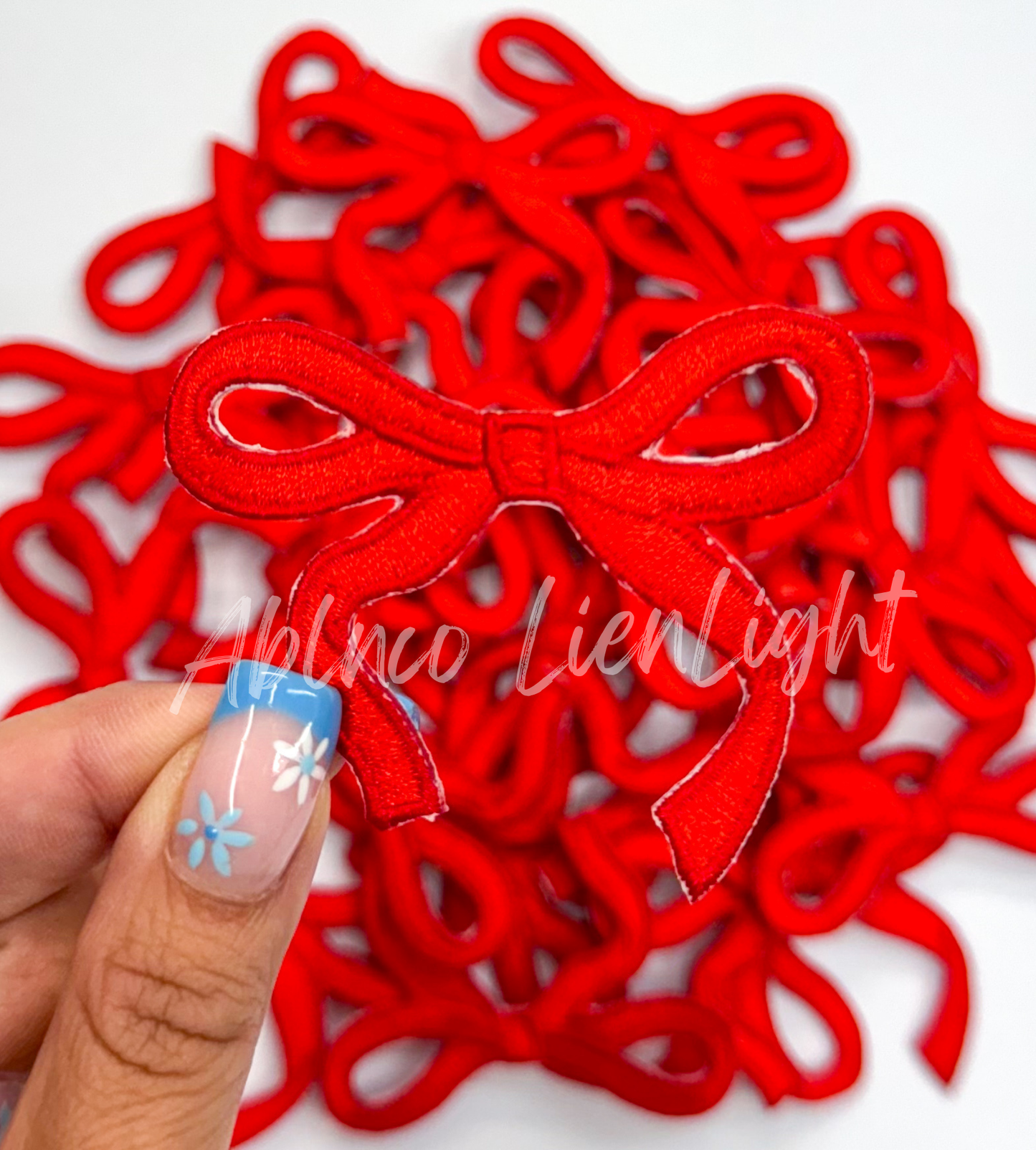 Red dainty bow patch